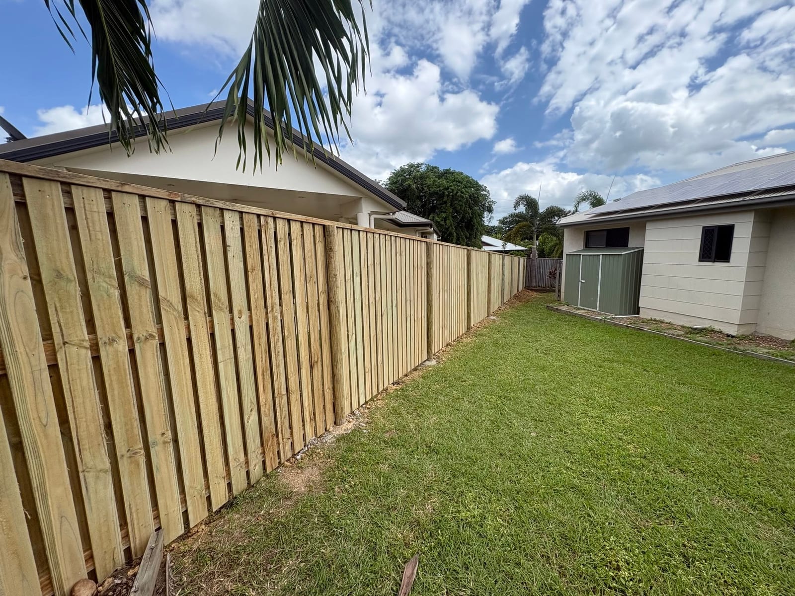 Fencing Townsville — timber fence built by G & T Hire fencing contractors